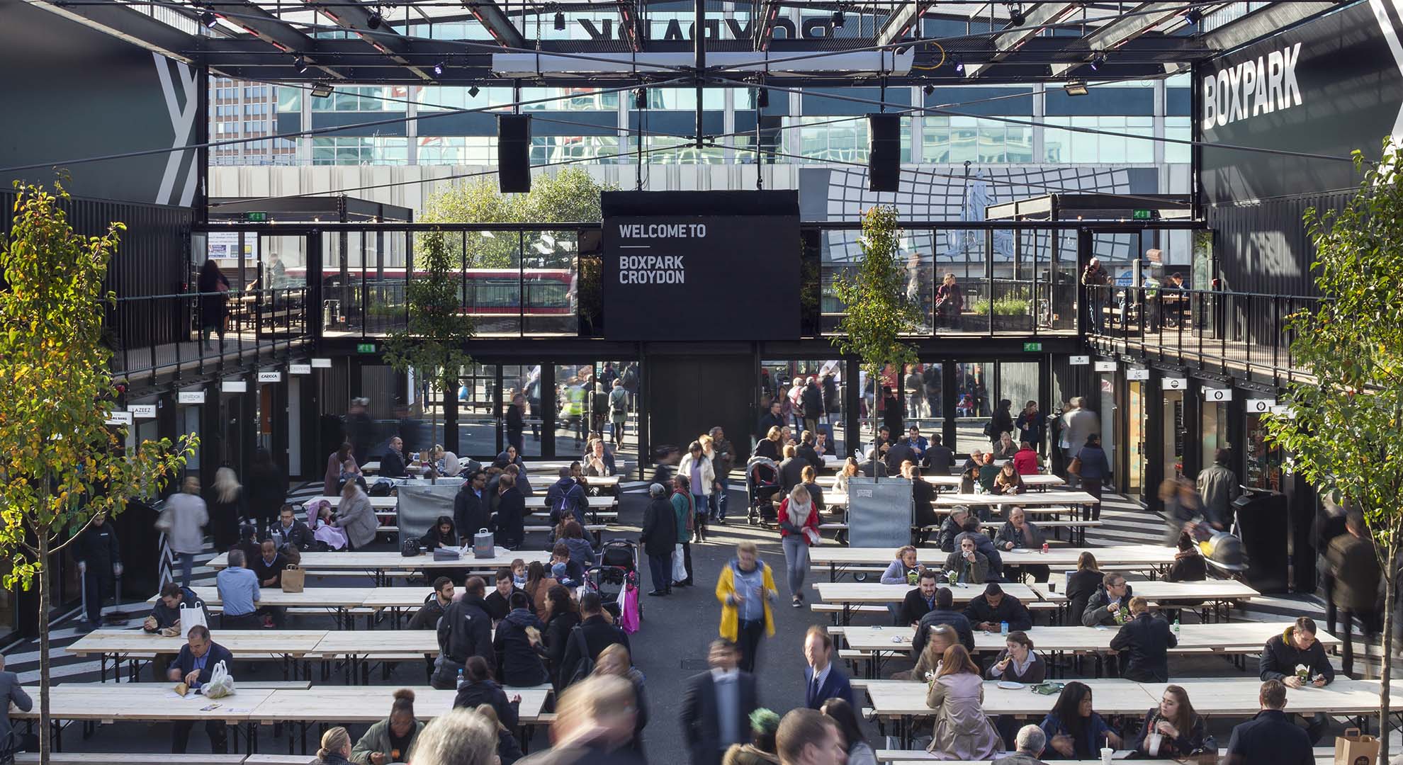 A café in Boxpark, Croydon, UK – a retail and food market made of shipping containers. Image by Nick Caville