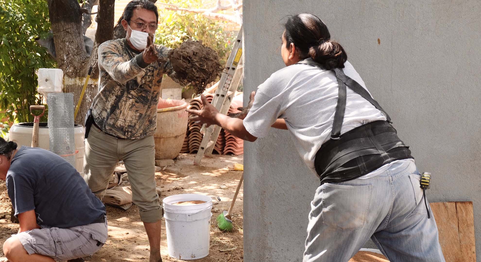 People working in a collaborative architecture program