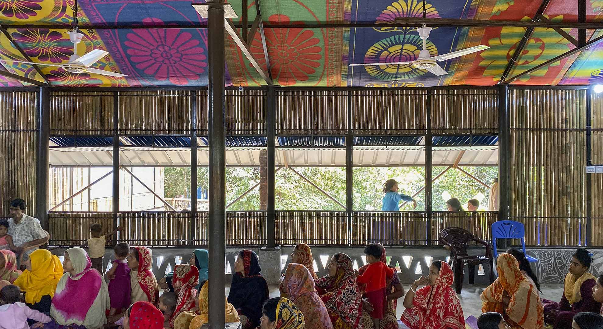 Women in The Hindupara Community Center temporary shelter