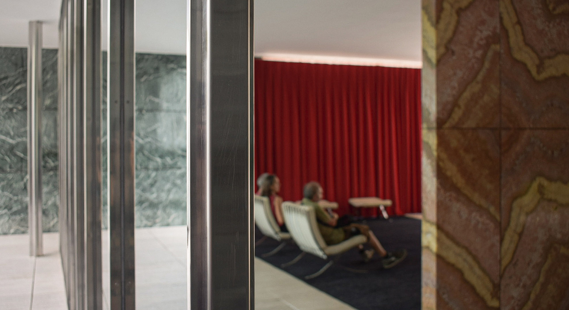 Polished steel profile on an interior window.