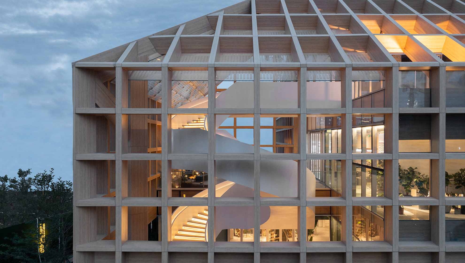 Close-up of Sanya Farm Lab’s wooden grid and spiral staircase, highlighting the blend of technology and tradition in modern sustainable design.