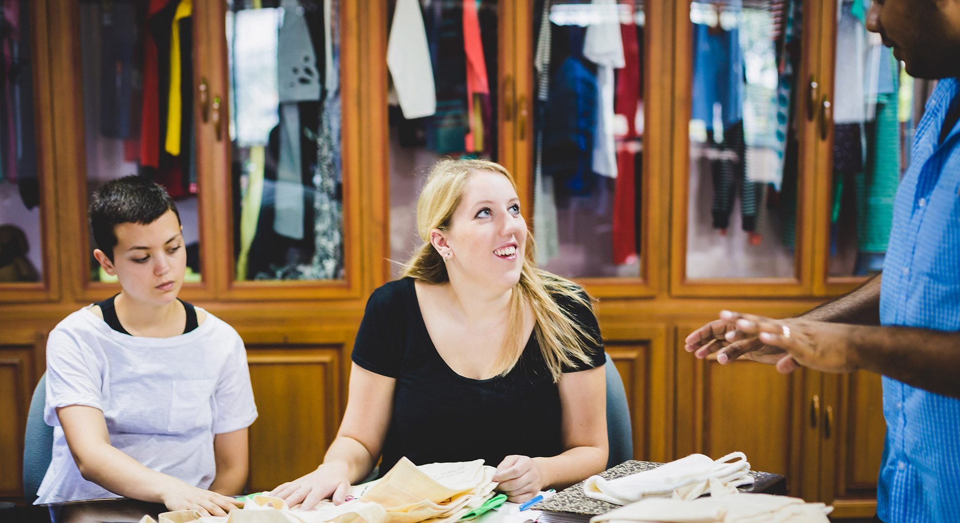 Charlotte Instone, founder of Know the Origin, working with a supply team in India. Image courtesy of Know the Origi